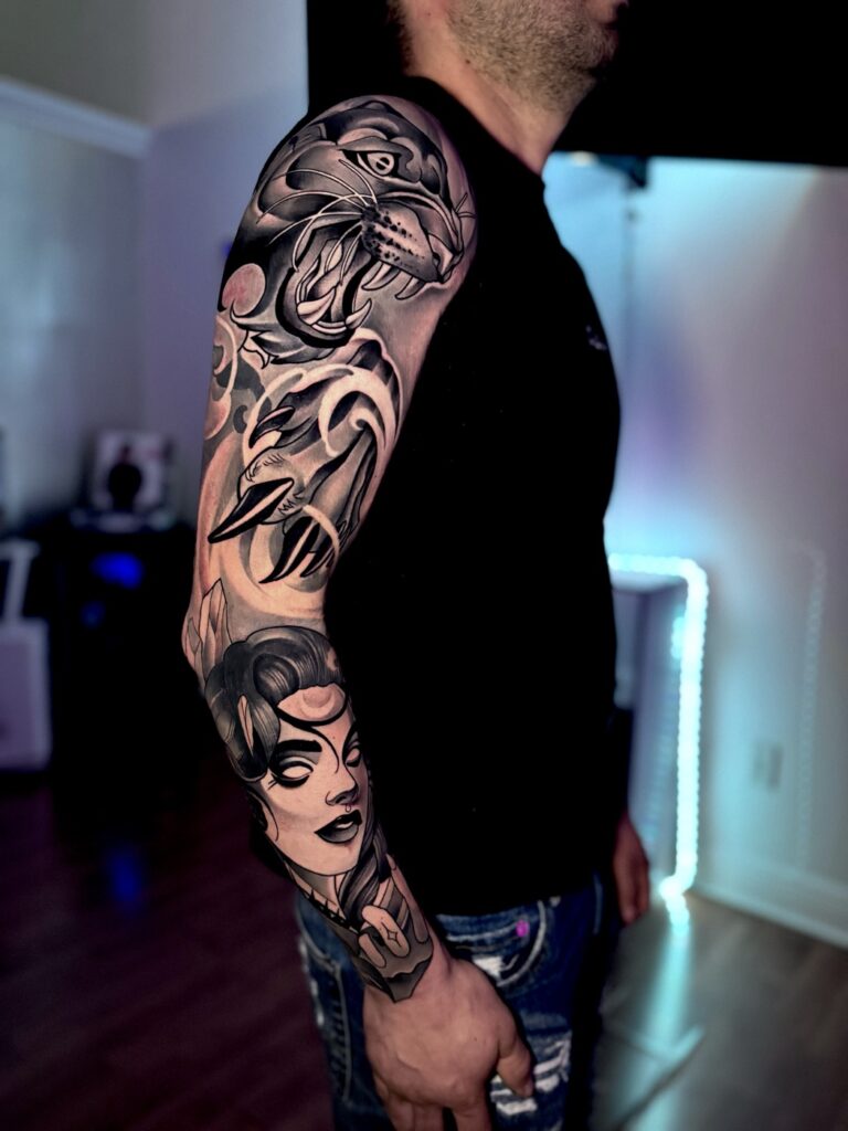Black & grey tattoo by Danny Art
